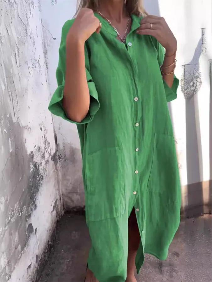 Flowy women's oversized button down shirt dress with practical pockets, a stylish casual midi for everyday wear.