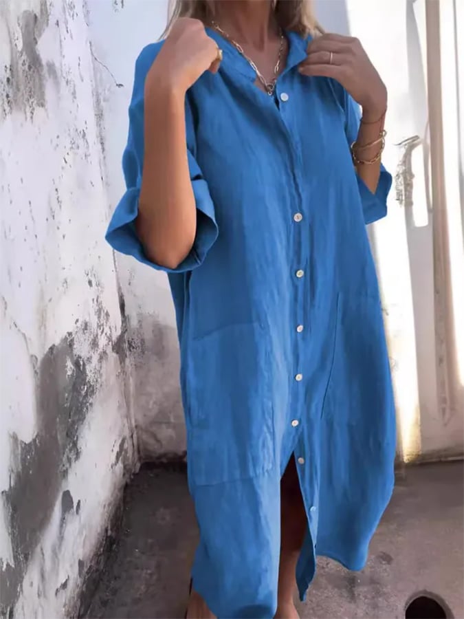 Casual oversized button down shirt dress for women, a relaxed fit midi with functional pockets, perfect for leisure.