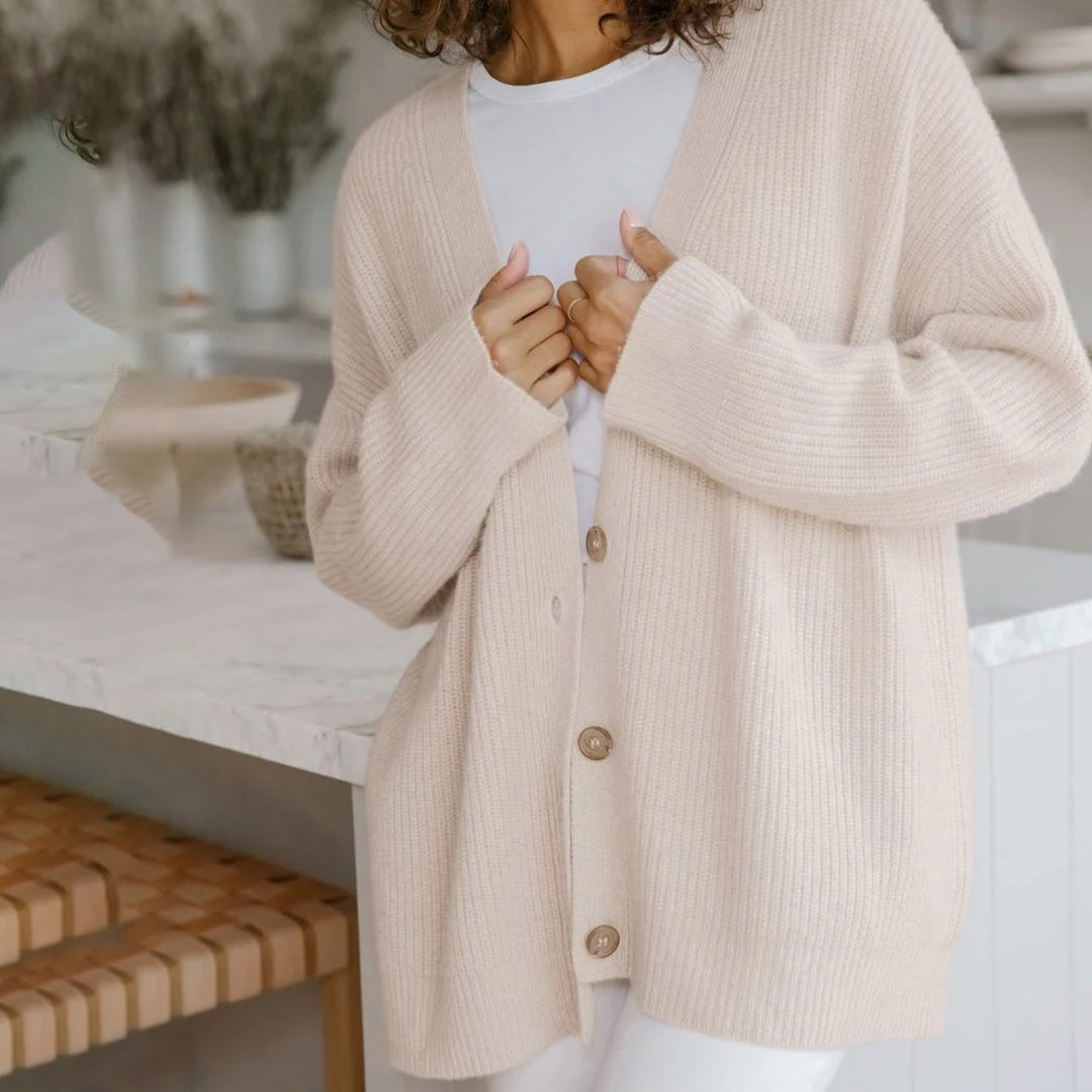 Warm & cozy knit oversized cardigan, a button-up layering piece for women's casual winter style.