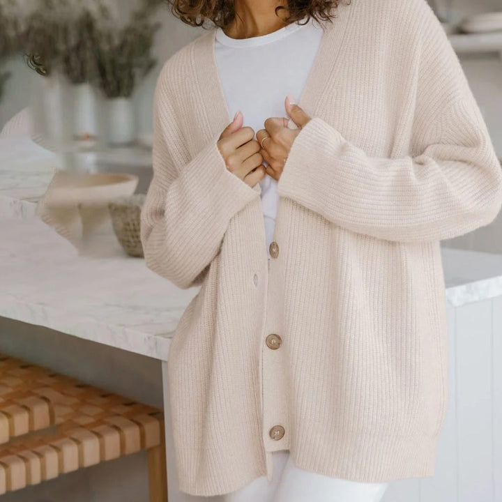Warm & cozy knit oversized cardigan, a button-up layering piece for women's casual winter style.
