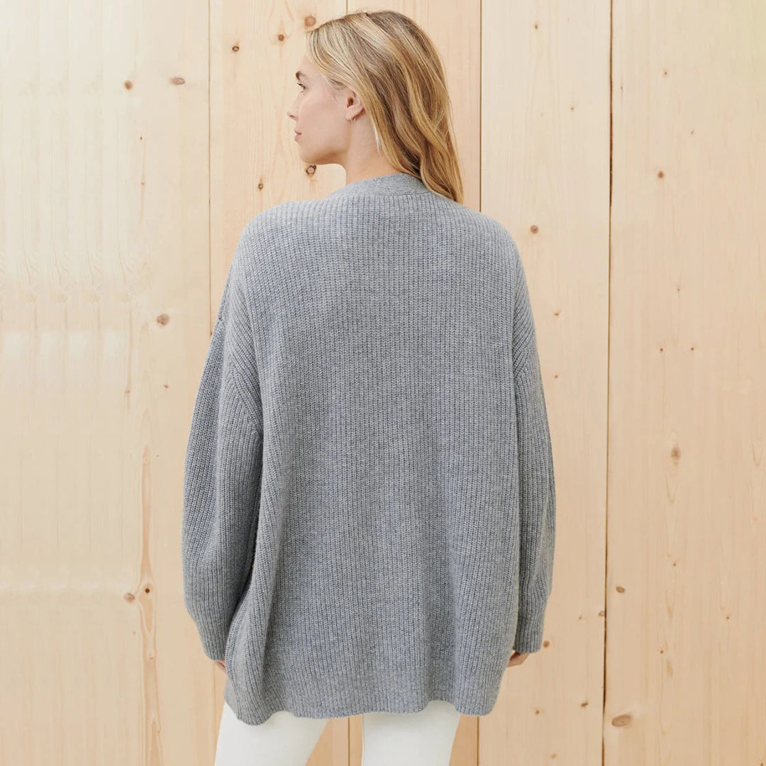 Versatile fall fashion oversized cardigan, a long-sleeve button-up for women's layering.