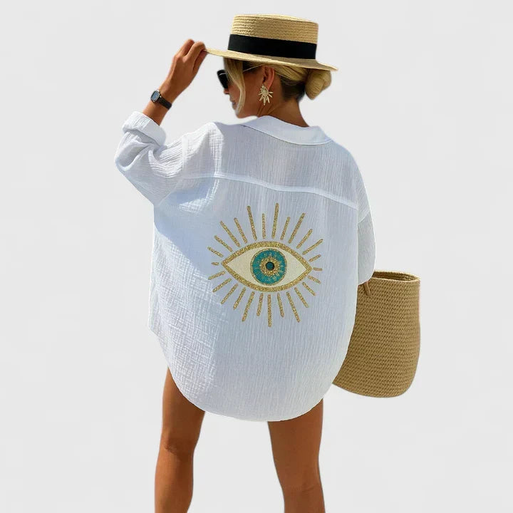 Relaxed fit Evil Eye oversized button-down beach tunic top for women. Ideal summer style & vacation outfit cover-up.