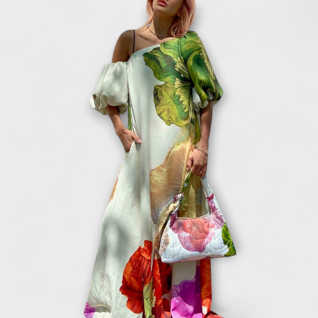 Women's oversized floral off-shoulder maxi dress with puff sleeves, perfect for summer elegance.