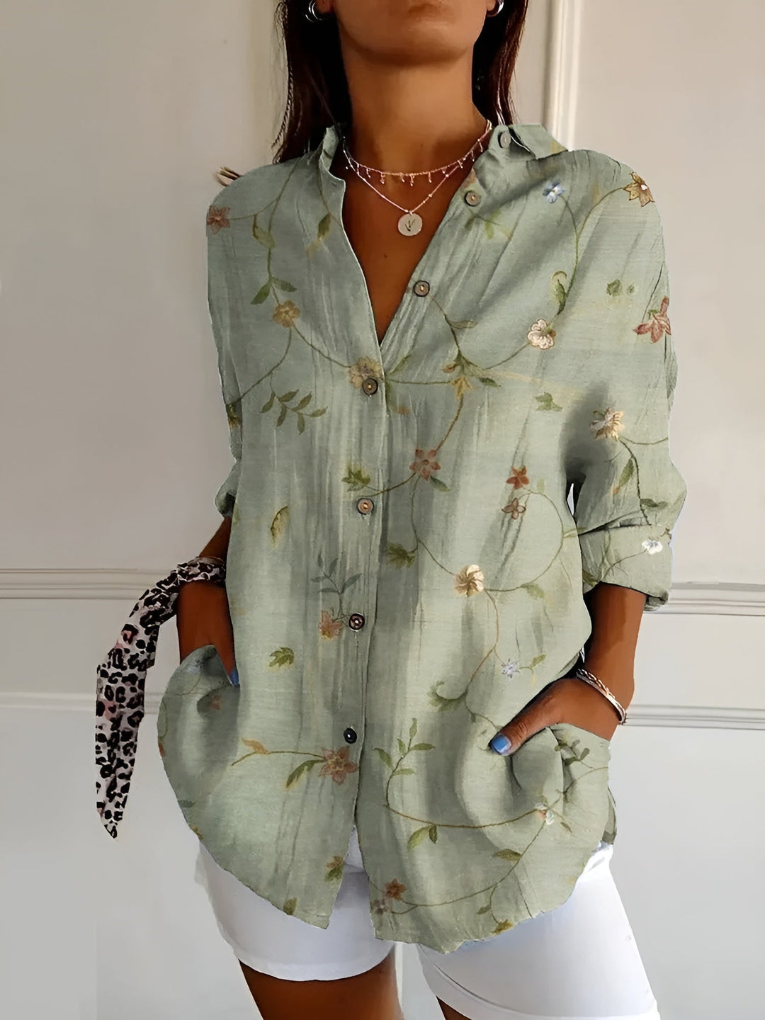 Relaxed fit women's floral vine print blouse. Versatile oversized button down top, perfect for everyday wear.