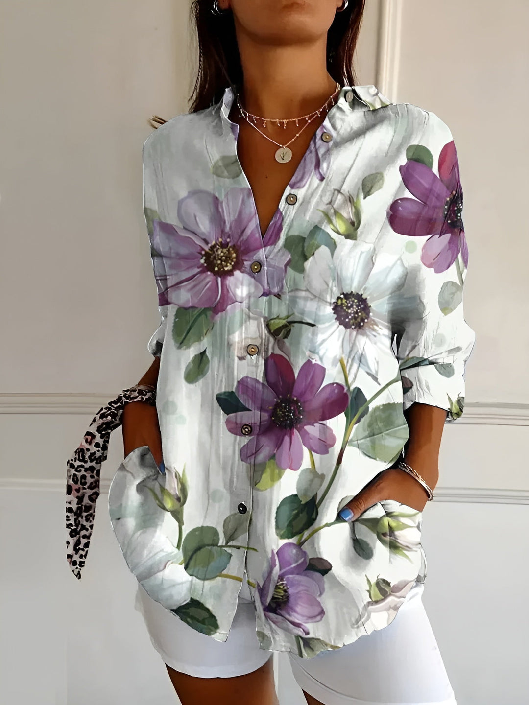 Women's casual oversized floral vine print blouse. Stylish long sleeve button down top for versatile everyday wear.