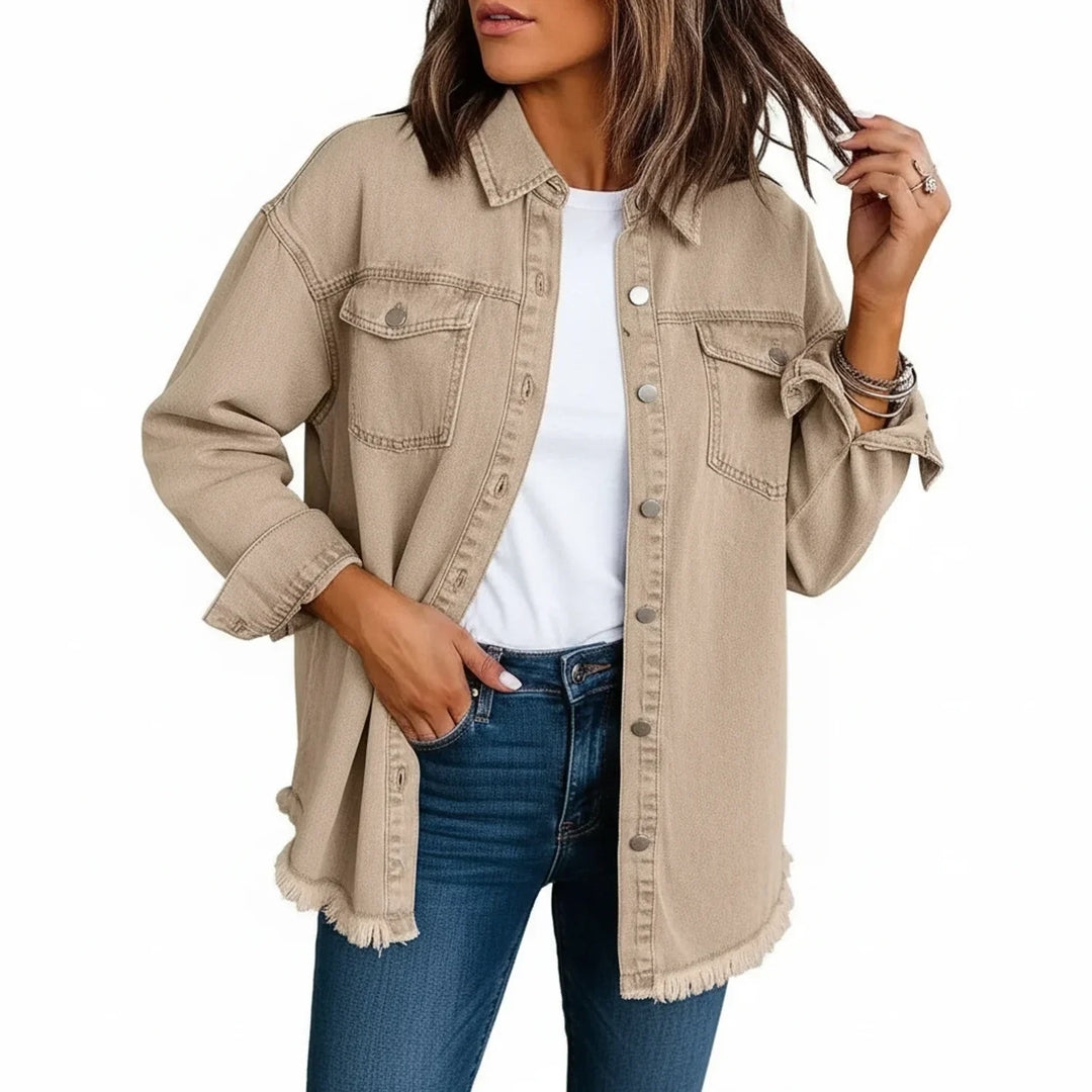 Women's oversized fringe hem shirt jacket, perfect for casual layering. Chic button-down style.
