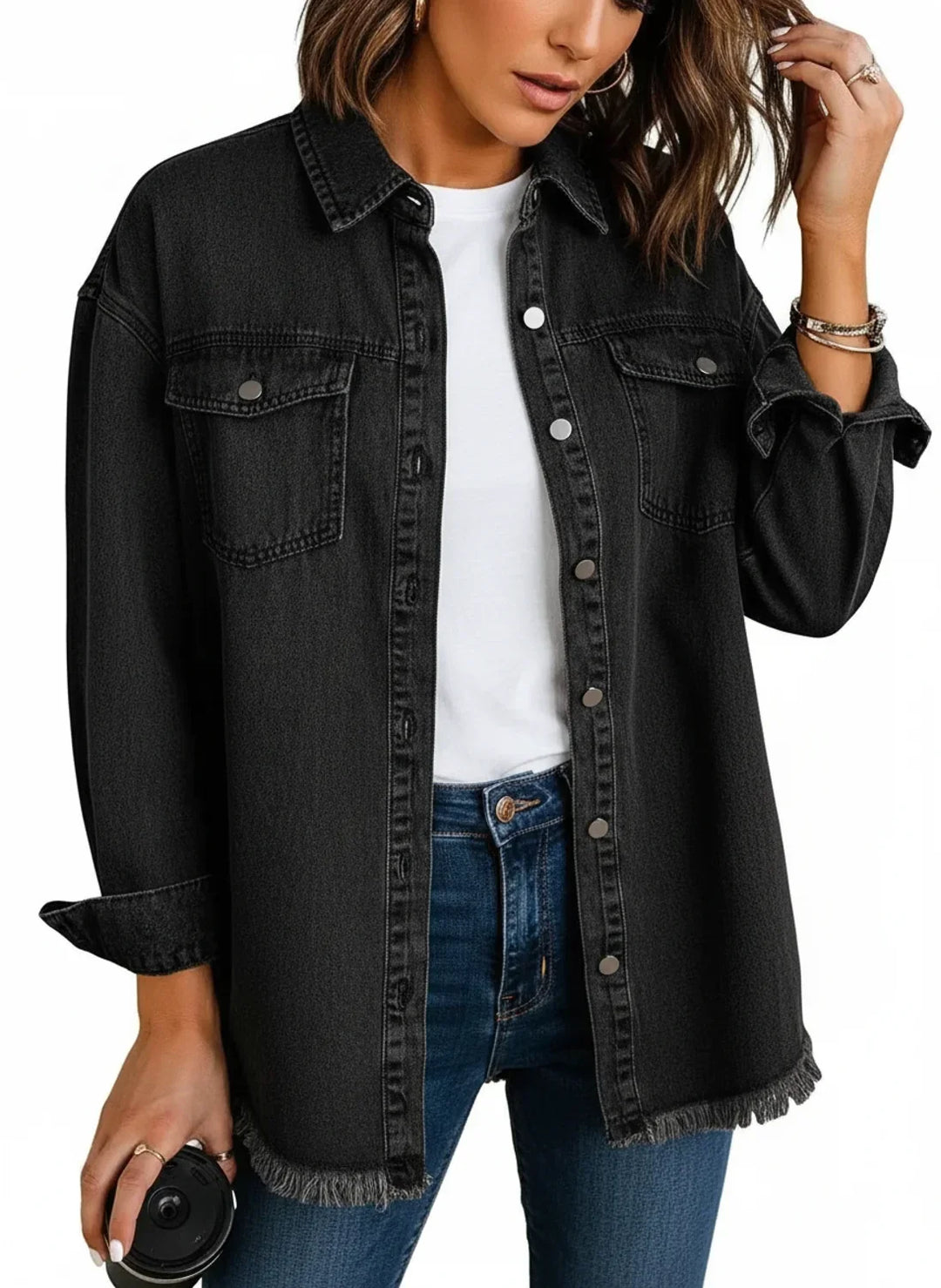 Chic women's oversized shirt jacket with stylish fringe hem and button-down front. Relaxed fit outerwear.