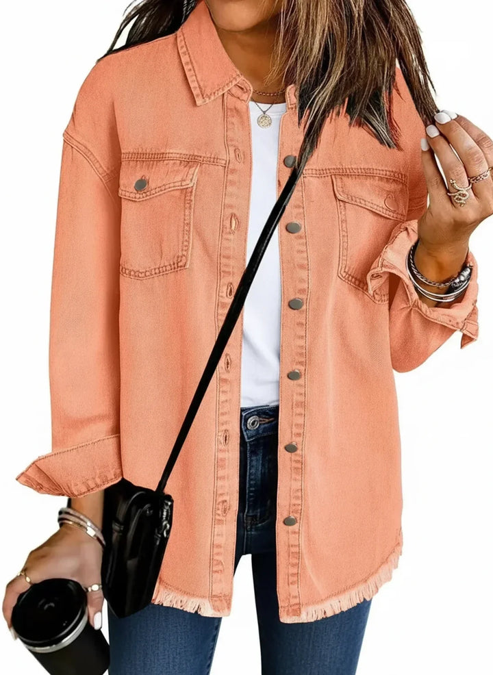 Modern women's oversized shirt jacket with chic fringe hem. Perfect for a casual, layered look.