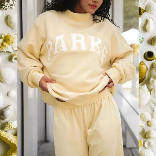 Loose fit women's pullover with a statement graphic, offering ultimate comfort for casual wear.