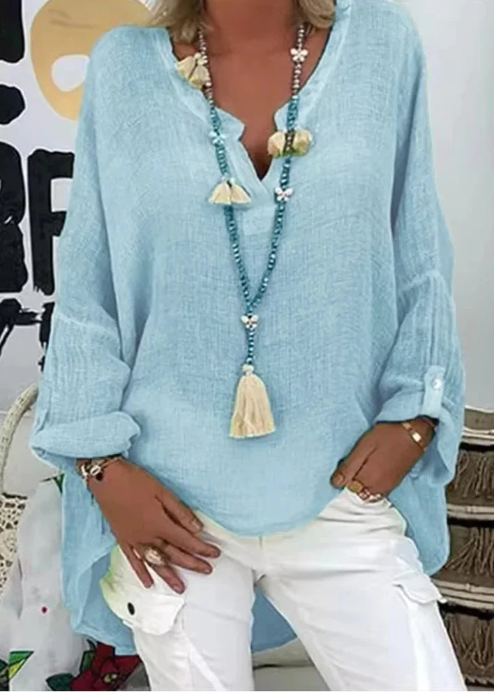 Comfortable women's oversized long sleeve blouse with soft touch fabric, button-up front. Casual chic style.