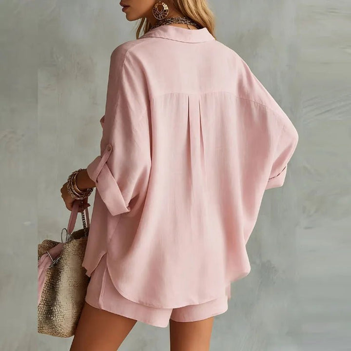 Relaxed fit women's oversized button-down shirt and matching shorts set. Perfect casual summer outfit.