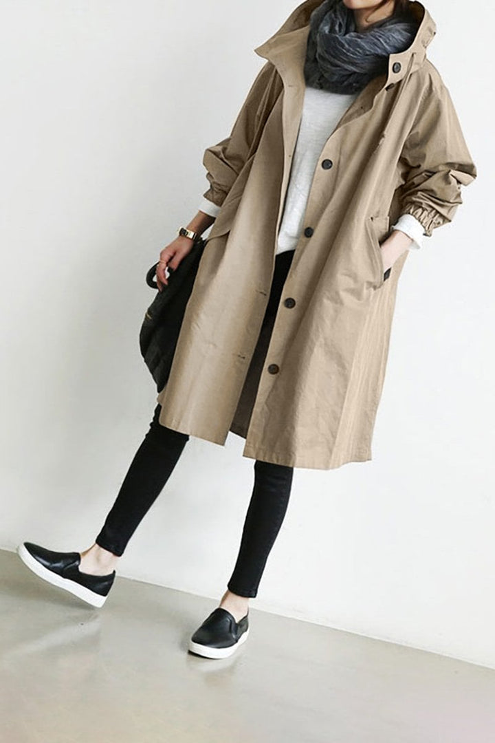 Women's water-resistant oversized rain parka. Ideal fall/spring jacket for lightweight outerwear.