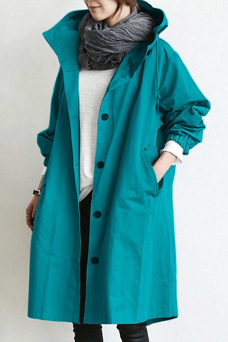 Women's oversized rain parka. Keeps you dry & stylish. A must-have water-resistant trench coat.