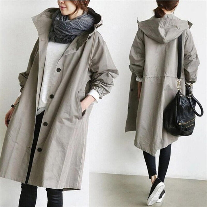 Women's oversized rain parka trench, shown in detail. Perfect water-resistant, lightweight outerwear.
