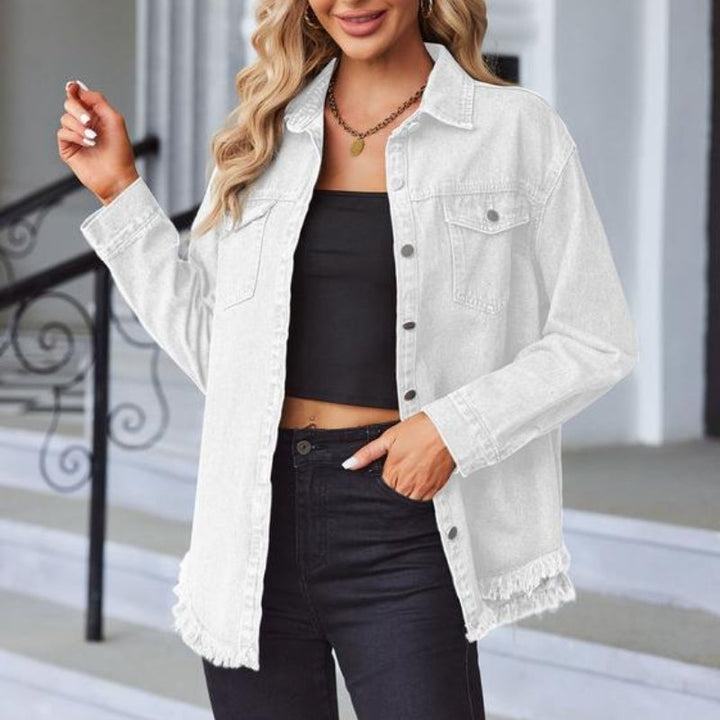 Versatile women's denim jacket, oversized with a raw hem and snap buttons, a must-have for outerwear.