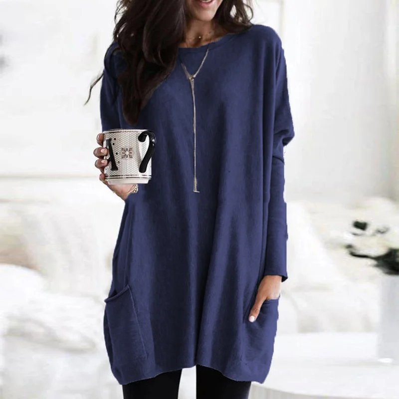Everyday women's oversized tunic top with pockets, offering a comfortable and relaxed fit for various casual occasions.