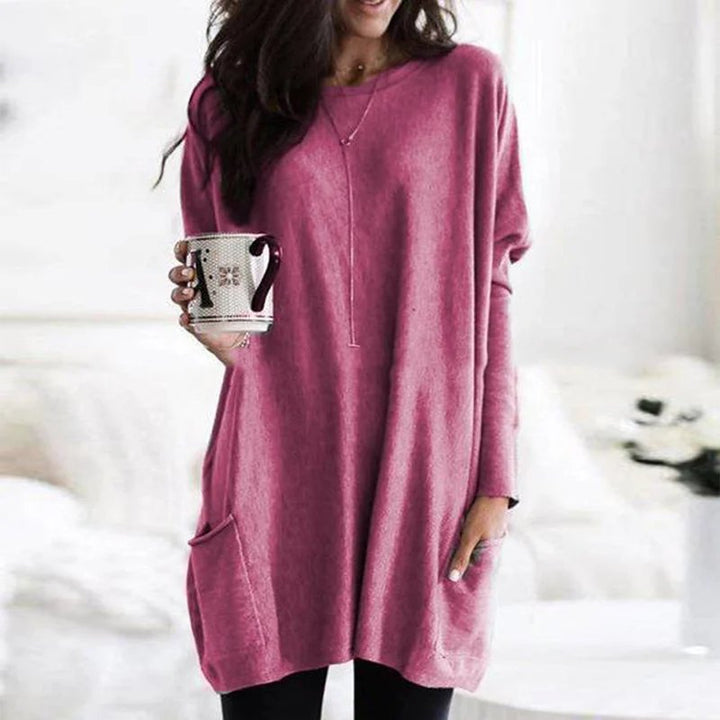 Versatile women's oversized tunic top with pockets, perfect for comfortable long sleeve casual wear or loungewear.