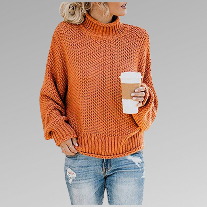 Women's oversized turtleneck sweater, cozy chunky knit, perfect for fall and winter comfort.