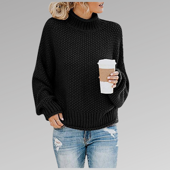 Relaxed fit women's oversized turtleneck sweater, soft and warm chunky knit for everyday comfort.