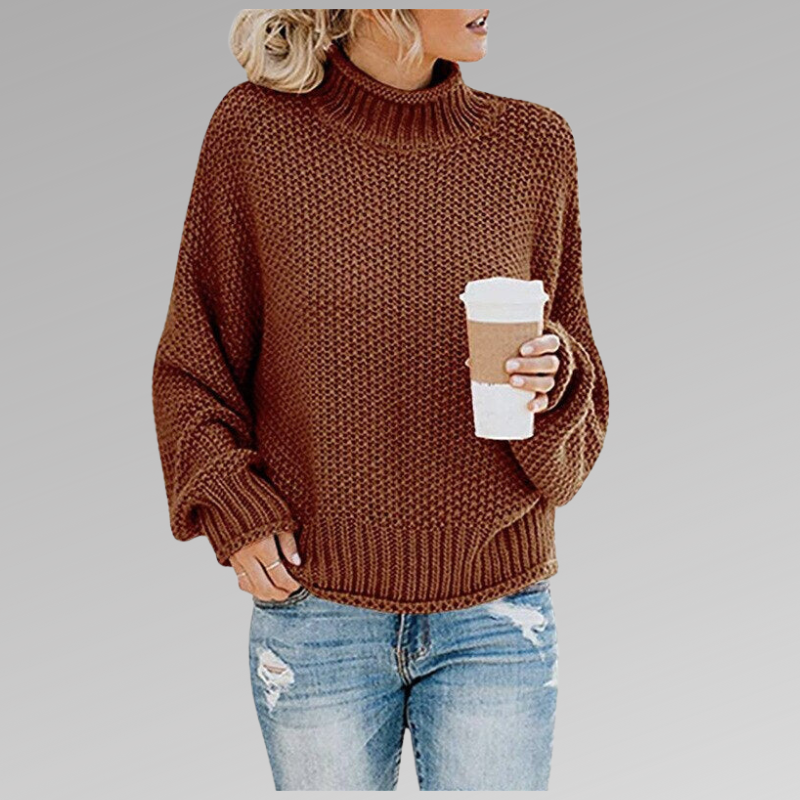 Cozy fall/winter fashion: a women's oversized turtleneck sweater with a stylish chunky knit texture.