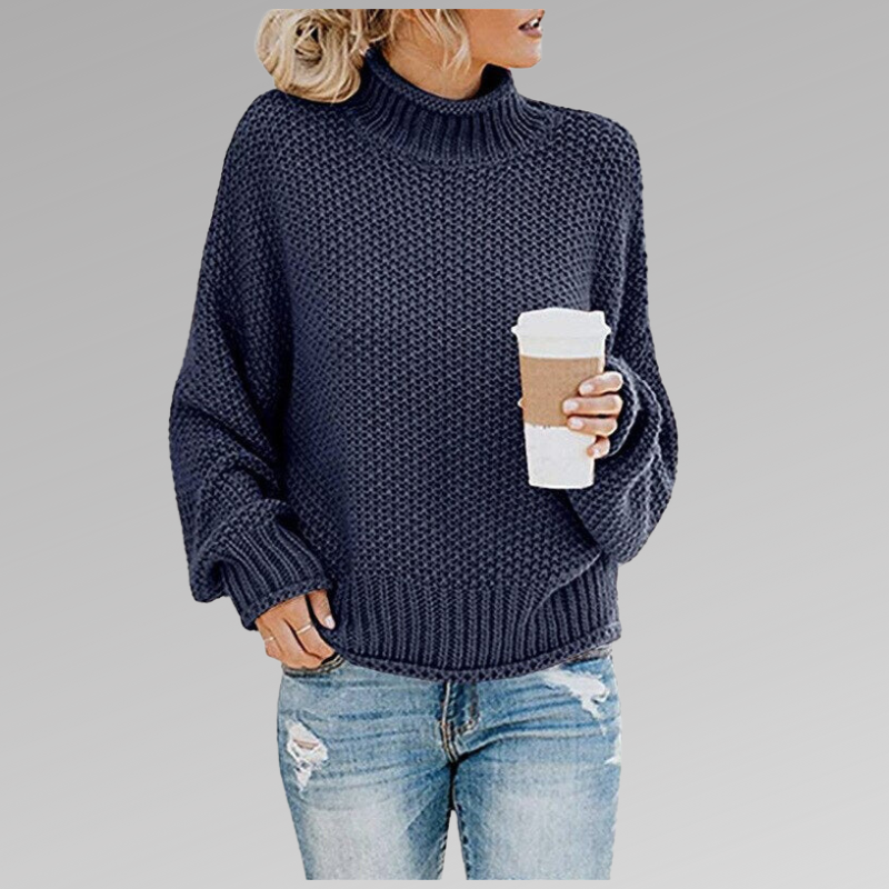 Soft women's everyday sweater with an oversized silhouette and a cozy chunky knit turtleneck.