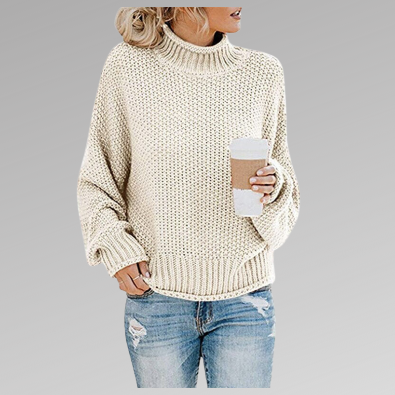 Comfortable oversized turtleneck sweater for women, made from a warm, chunky knit for ultimate coziness.