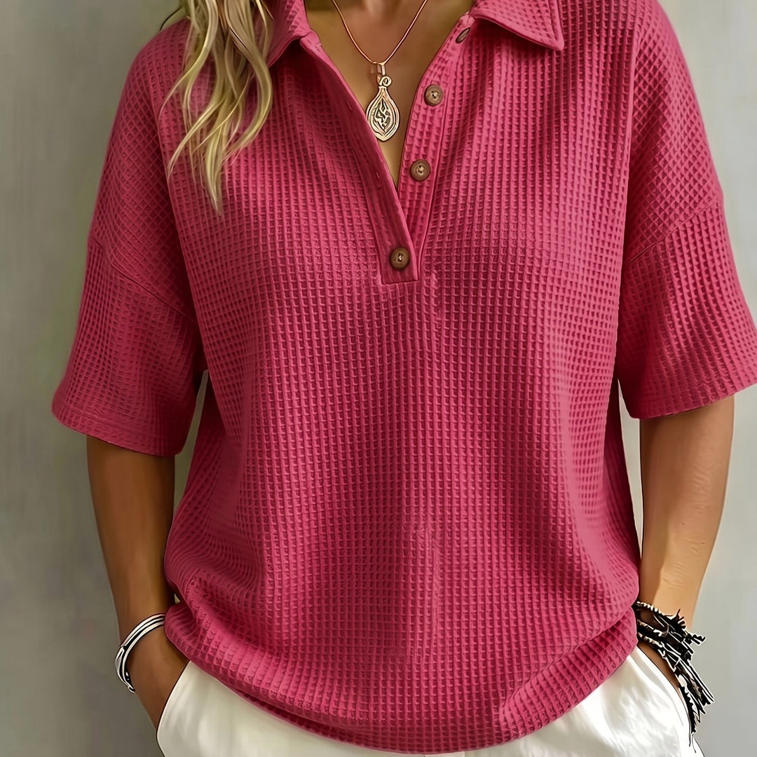 Trendy oversized women's polo top with modern waffle texture and comfortable dropped shoulders.