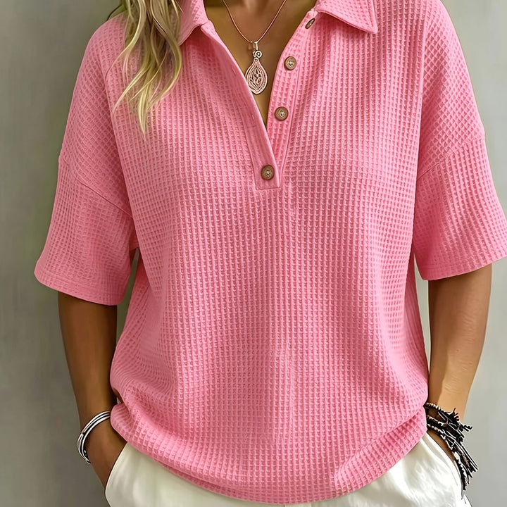Chic women's oversized polo top, featuring a unique waffle texture and button placket.