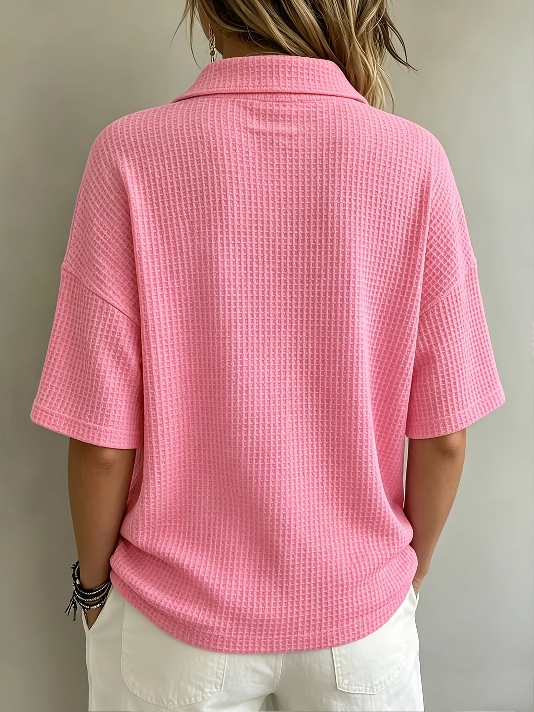 Breathable waffle textured women's oversized polo, a comfortable and stylish top.