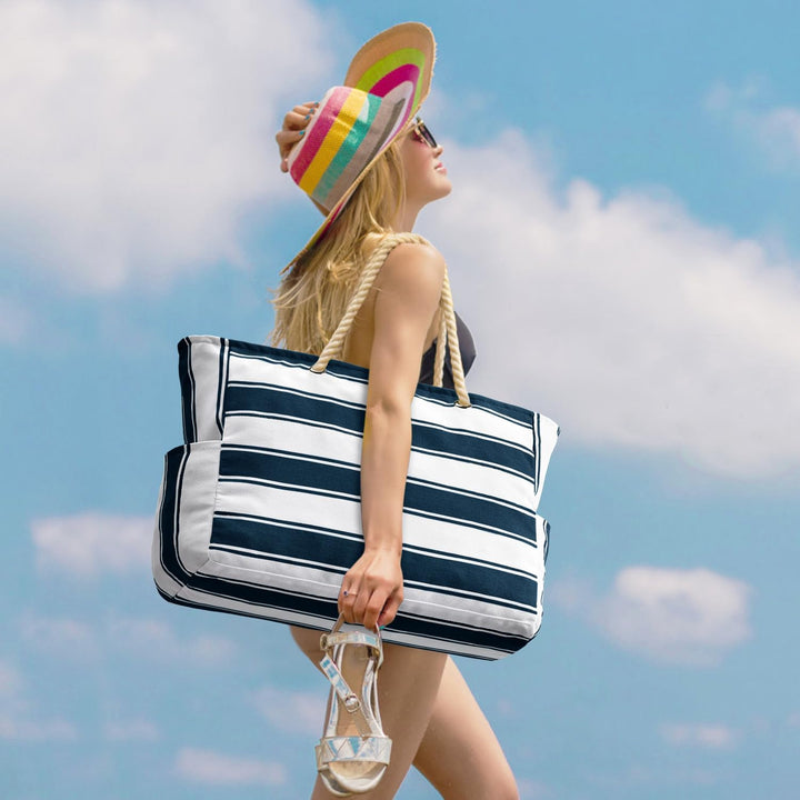 Fashionable beach tote for women, waterproof & spacious for travel.
