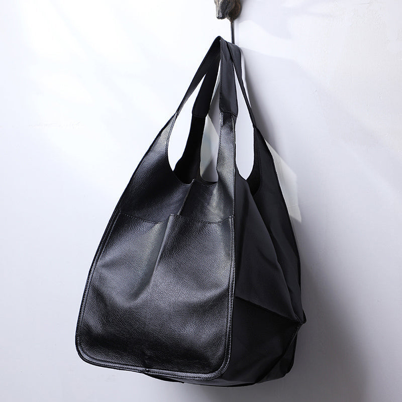 Durable red women's shoulder bag, perfect for weekend getaways.