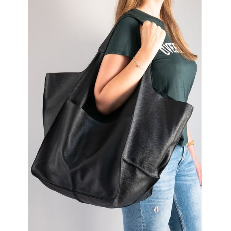 Yellow women's weekend carry-all bag, designed for convenience and fashion.