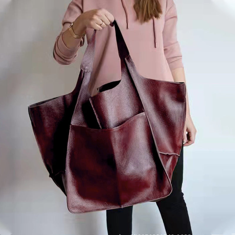 Versatile brown oversized travel bag, perfect for weekend trips.