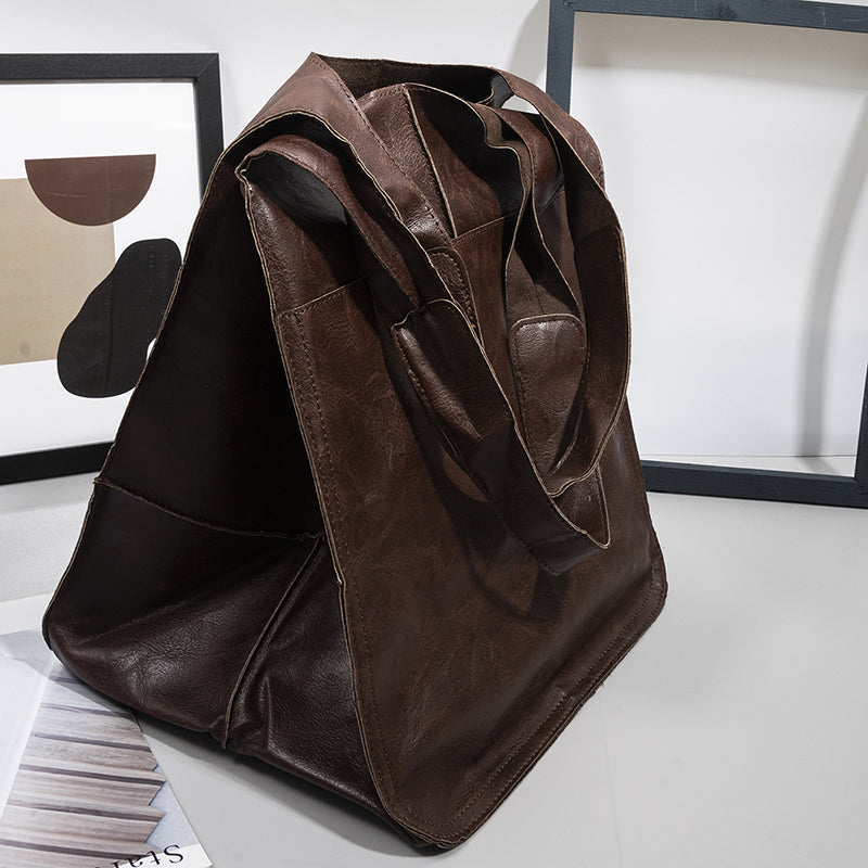 Stylish women's black shoulder bag, ideal for daily essentials & travel.