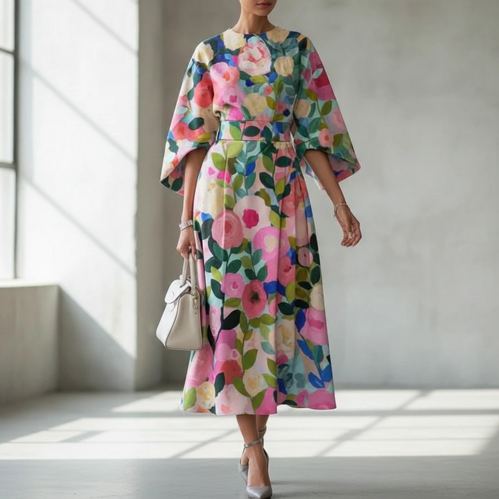 Women's Painterly Floral Puff Sleeve Midi Dress for wedding guests. Elegant A-line summer occasion wear.
