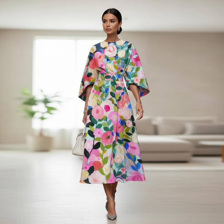 Artistic floral print midi dress with puff sleeves. Chic women's A-line style, perfect for garden parties & events.