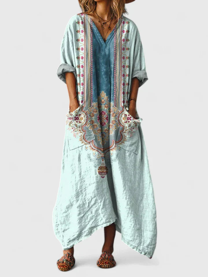 Oversized women's relaxed fit maxi dress with a vibrant paisley pattern, v-neck, perfect for summer.