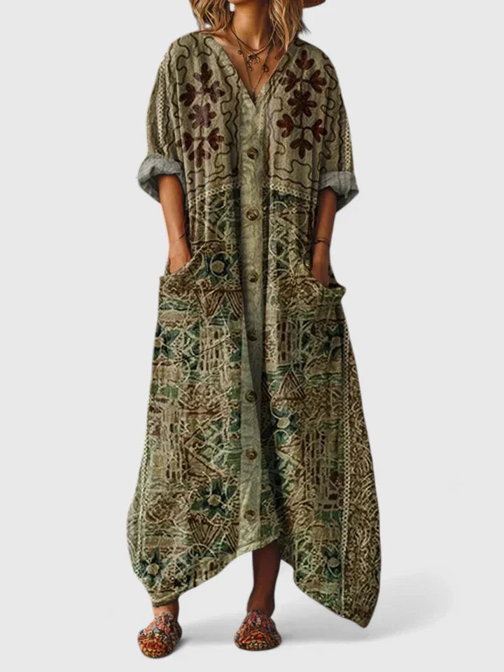 Elegant long women's boho maxi dress, showcasing a unique paisley print, v-neck, and spacious patch pockets.