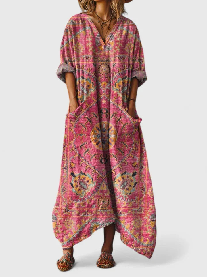 Stylish women's bohemian paisley maxi dress, loose fit with a flattering v-neck and functional patch pockets.