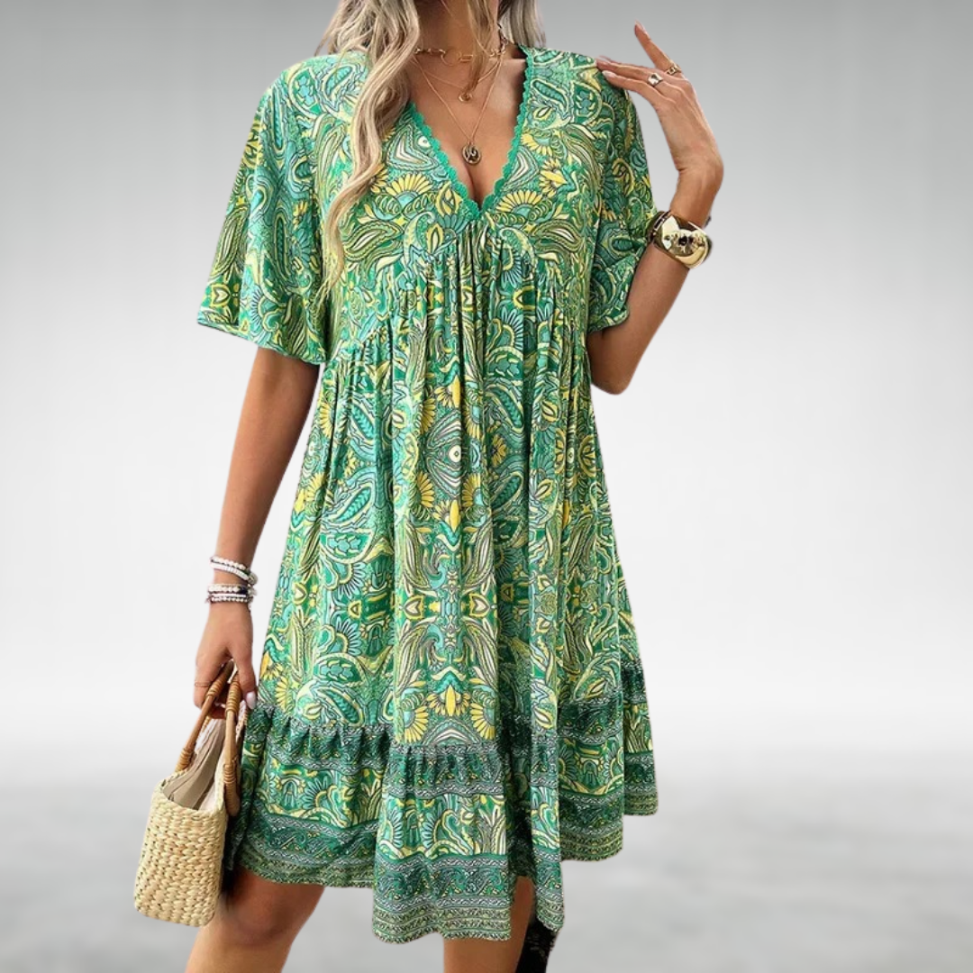 Women's paisley boho mini dress with lace trim, ruffles, and V-neck, perfect for summer.
