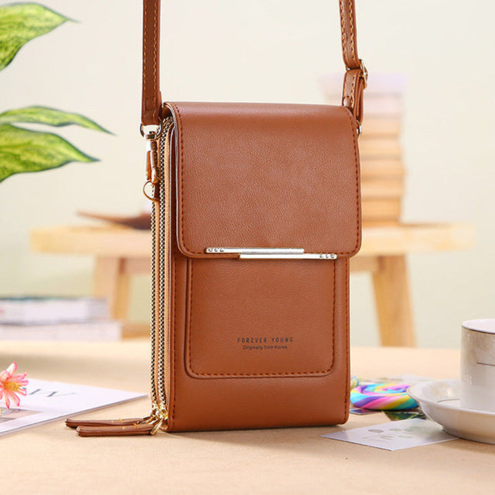 Women's phone shoulder bag with clear touchscreen compartment; stylish & hands-free. Perfect for daily essentials.