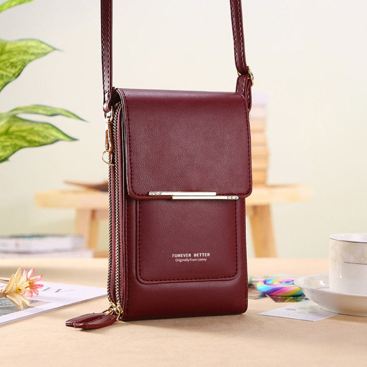 Blue women's phone shoulder bag, modern design with a clear touchscreen compartment for easy smartphone use.