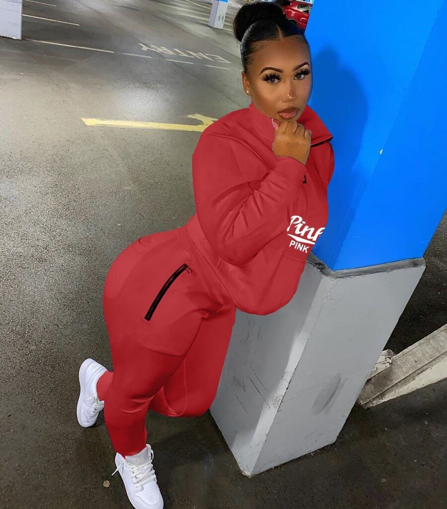 Modern women's pink lettered athletic set, a chic two-piece for spring and summer style.