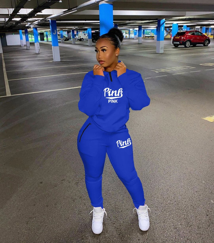 Stylish women's pink letter print two-piece athletic wear, a trendy tracksuit for spring fashion.