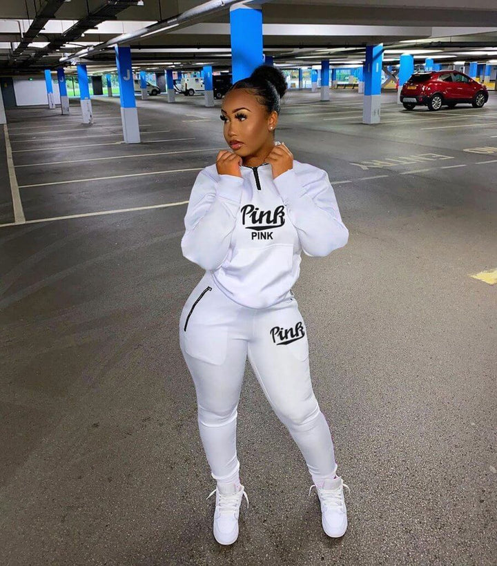 Fashionable women's pink letter print two-piece athletic set, comfy and stylish loungewear.