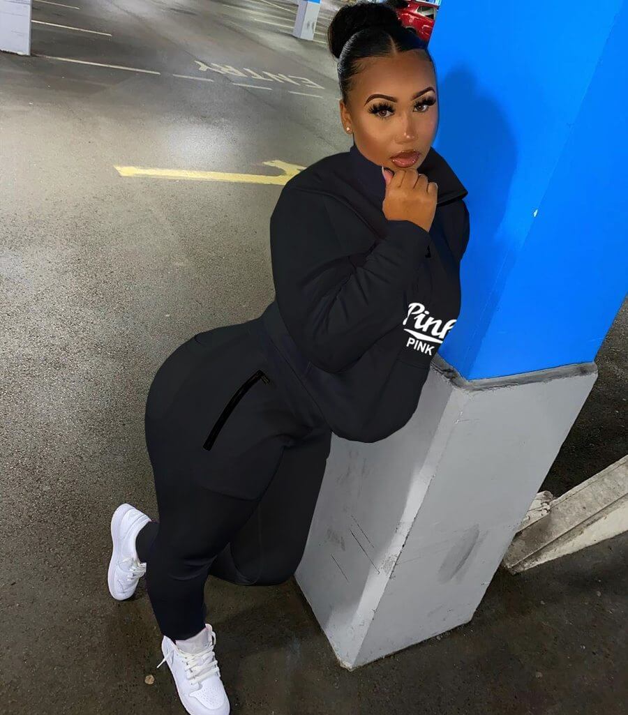 Sporty women's pink letter print two-piece tracksuit, athletic wear for comfort and style.