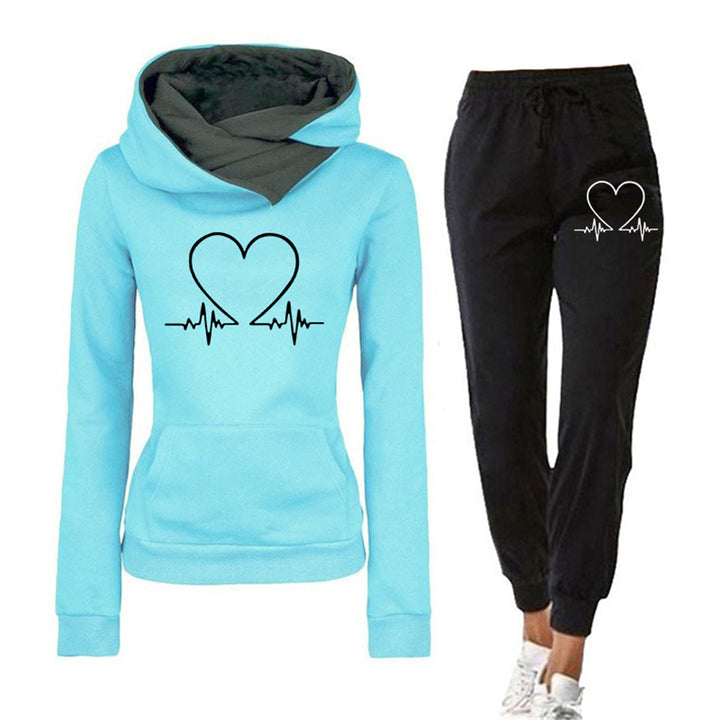 Casual women's two-piece tracksuit: hooded sweatshirt and joggers with heart design