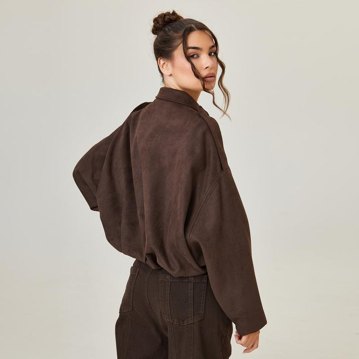 Stylish women's cropped bomber jacket in soft brown faux suede, perfect for fall fashion