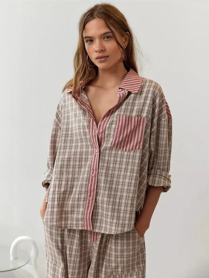 Women's plaid button-up pajama set with relaxed fit pants, perfect for cozy sleepwear.