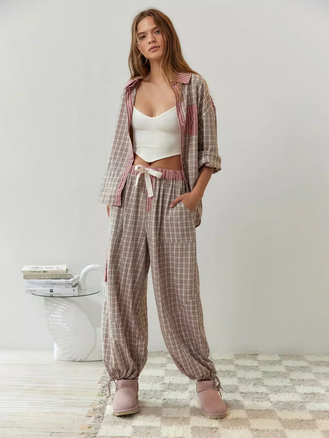 Cozy women's plaid pajama set, button-up top and relaxed pants, a comfortable gift for her.